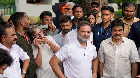 Leader of Opposition in the Lok Sabha Rahul Gandhi with Congress MP KC Venugopal, and others, stages a sit-in protest near the Prime Minister's residence over alleged irregularities in the NEET examination, in New Delhi, Tuesday, July 21, 2026.