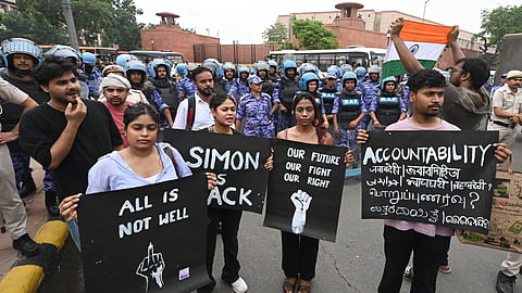 Cockroach Janata Party (CJP) supporters raise slogans during a protest march, near the Parliament in New Delhi, Monday, July 20, 2026
