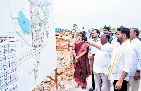 Chief Minister A Revanth Reddy inspects the ongoing construction works of the colleges at Education Hub at Hakeempet village in Vikarabad district on Tuesday