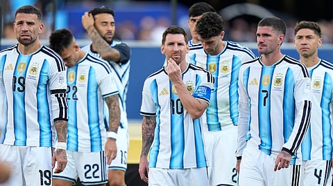 Argentina's Lionel Messi (10), center, and teammates react after their loss in the World Cup final soccer match against Spain in East Rutherford, N.J., near New York, Sunday, July 19, 2026.
