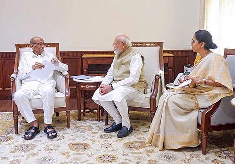 Prime Minister Narendra Modi interacts with NCP (SP) President Sharad Pawar during a meeting, at Parliament House, in New Delhi. Party MP Supriya Sule is also seen.