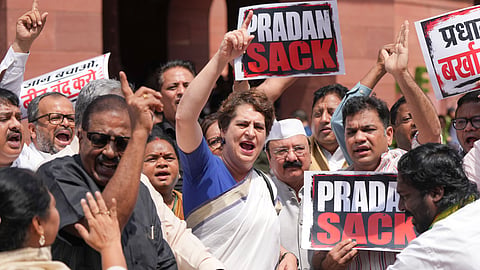 Congress MPs Priyanka Gandhi Vadra, Kishori Lal Sharma and Hibi Eden and others raise slogans during a protest by opposition leaders demanding the resignation of Union Education Minister Dharmendra Paradhan over the NEET paper leak issue, amid the ongoing Monsoon session of Parliament, in New Delhi, July 23, 2026.