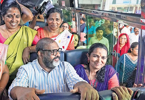 Transport Minister C P John travels on a Pink Bus with women passengers after inaugurating the service in Thiruvananthapuram on Thursday