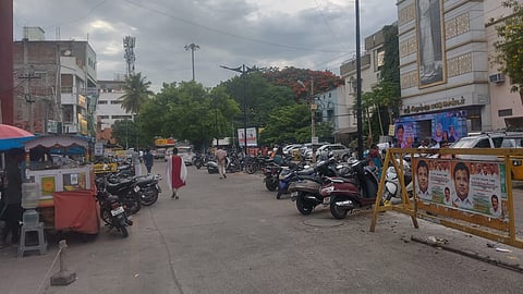 Encroachment by two-wheelers in the commercial zone surrounding the Dharmapuri Old Bus Stand.