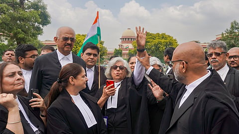 Advocates gather on the Supreme Court premises to read the Preamble to the Constitution in solidarity with protesting students and against the alleged police action at Jantar Mantar.