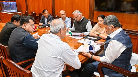 Chief Minister DK Shivakumar, Home Minister Priyank Kharge and other officials during a meeting at Vidhana Soudha on Thursday.