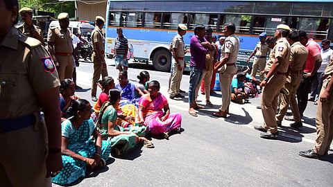 The family members of the deceased youth, Arunachalam, staging a sit-in protest in Thoothukudi on Thursday, refusing to accept the body of the victim