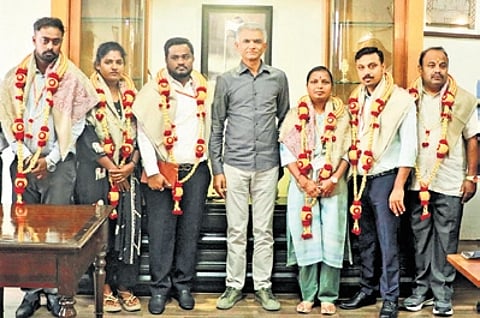 Minister Krishna Byre Gowda with GBA staff after felicitating them on Friday