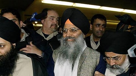 Sikh activist Ripudaman Singh Malik (centre) leaves a Vancouver court on March 16, 2005, after being found not guilty in the 1985 bombing of an Air India flight off the Irish coast.
