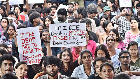 Student groups and activists protests at Communist Party of Indias (CPI), T. Nagar, office in solidarity with Cockroach Janatha Party protest at Jantar Mantar, Delhi, demanding to scrap the `NEET examination and the resignation of Union Education Minister Dharmendra Pradhan, in Chennai on Thursday