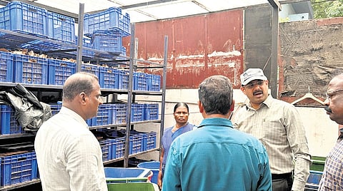 Corporation Commissioner GS Sameeran inspecting the segregation of domestic solid waste at a residential enclave (Khushal Gardens) on Friday.