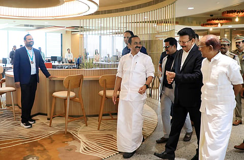 Kerala Chief Minister V. D. Satheesan interacts with VK Mathews, Founder and Executive Chairman of the IBS Group, during a visit to the newly inaugurated NaviQ Technology facility at the IBS Software campus in Infopark, Kochi, on Thursday.