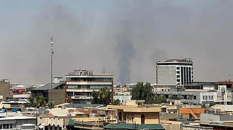 Black smoke rises following explosions near a military base hosting U.S. forces in the northern Iraqi city of Irbil, Friday, July 24, 2026.