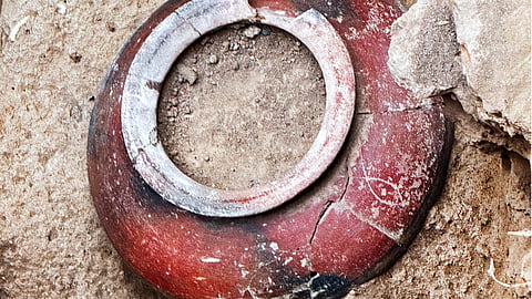 The terracotta pot marked with a fish symbol found during the 11th phase of Keezhadi excavation.