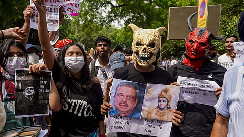 CJP protesters celebrate at Delhi's Jantar Mantar after Union Education Minister Dharmendra Pradhan announced his resignation on Saturday, July 25, 2026.
