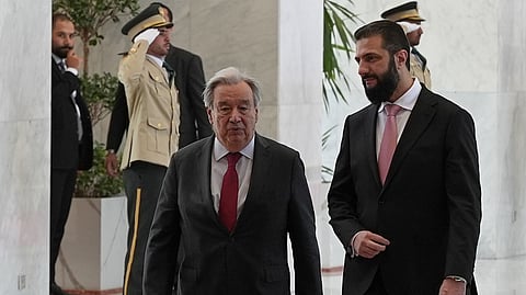 Syrian President Ahmad al-Sharaa, right, walks with United Nations Secretary General Antonio Guterres at the Syrian presidential palace in Damascus, Syria, Saturday, July 25, 2026.