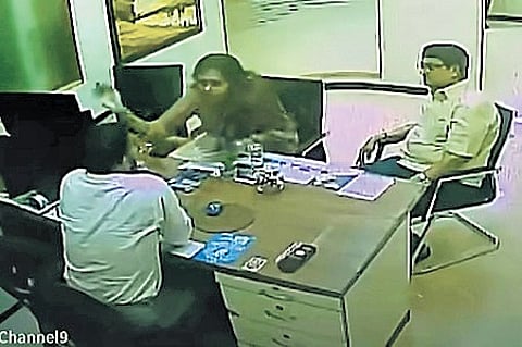 CCTV footage grab shows Kayalvizhi Azhagiri slapping the manager