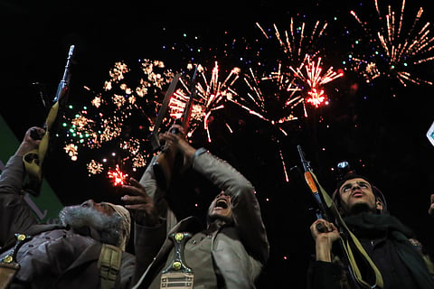 Fireworks burst as Houthi supporters rally against the Saudi-led coalition in Sanaa, Yemen, Monday, July 20, 2026.