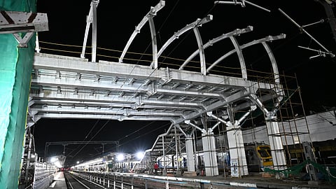 The foot over bridge construction underway at Kollam railway station