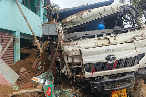 The driver was injured after the vehicle veered off NH-59, while locals demanded action against alleged illegal sand mining and reckless transportation.