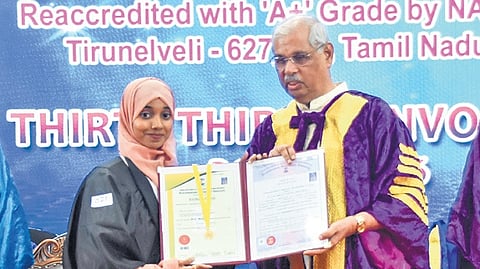 Governor Arlekar hands over degree certificate to a graduant during the 33rd convocation of MSU on Tuesday