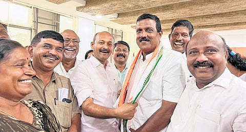 Ernakulam DCC president and Kochi MLA Mohammed Shiyas congratulates UDF’s deputy mayor nominee V R Sudheer after the official announcement. Ernakulam MLA T J Vinod and other councillors are also seen