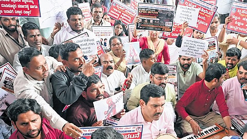 State BJP president BY Vijayendra joins protesting KPSC aspirants, at Freedom Park in Bengaluru on Tuesday.