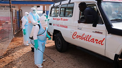 Health workers disinfects an ambulance at Ebola Treatment Center at Bunia General Hospital in Ituri, Congo, Wednesday, July 22, 2026.