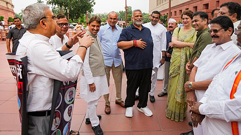 TMC MP Kalyan Banerjee stage a protest as Congress MPs Priyanka Gandhi Vadra, Imran Masood, MP Pappu Yadav and others look on during the Monsoon session of Parliament, in New Delhi, Thursday, July 30, 2026.