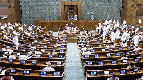 Opposition MPs stage a protest in the Lok Sabha during the Monsoon session of Parliament in New Delhi, Thursday, July 30, 2026.