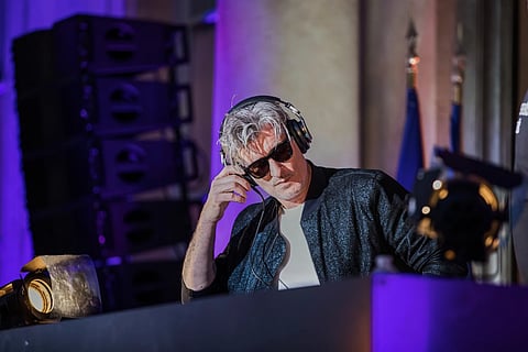 French Vincent Belorgey, known as Kavinsky, performs during the ‘Fete de la Musique’, the music day celebration in the courtyard of the Elysee Palace, in Paris, Thursday, 21 June 2018.