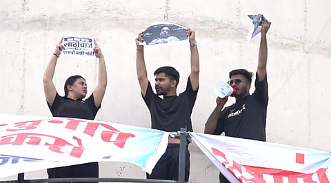 Jaipur: Three NSUI leaders climb water tank near Gandhi Nagar station to stage a protest against student union polls and the police action on Jantar Mantar protestors over the NEET paper leak issue, in Jaipur, Rajasthan, Thursday, July 30, 2026.