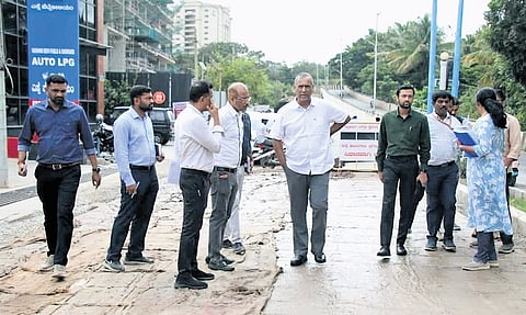 Greater Bengaluru Authority Chief Commissioner M Maheshwar Rao inspects white topping of a road in Bengaluru North City Corporation limits on Friday