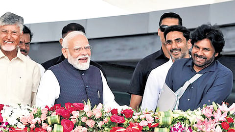 PM Narendra Modi, CM Nara Chandrababu Naidu, Dy CM Pawan Kalyan, Minister for IT Nara Lokesh and BJP State president PVN Madhav watch Dhimsa dance as they enter the public meeting venue at ASR International Airport on Saturday.