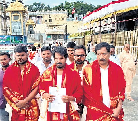 Minister R Vinoth, carrying the draft Agriculture Budget for 2026-27, at the Tirupati temple on Saturday