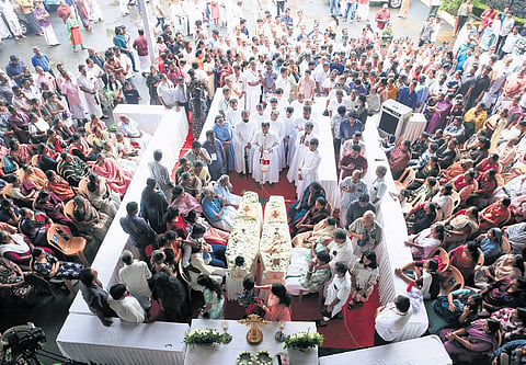 The mortal remains of Regina Johny and son, Josephin Johny, who were killed in the landslide at Payyanithottam, Poonjar, being kept for public homage on the Holy Spirit Public School campus