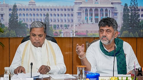 Karnataka Chief Minister DK Shivakumar and former state chief minister Siddaramaiah during an all-party meeting to chalk out the state's legal and political strategy on the Cauvery water-sharing dispute with Tamil Nadu, following the CWRC's direction to release 3,500 cusecs of water daily for 15 days, in Bengaluru, Sunday, Aug. 2, 2026.