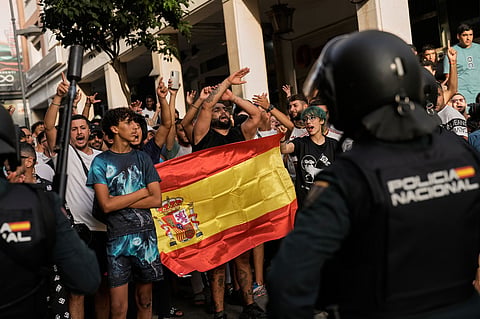 Ceuta residents demonstrate against the arrival of Spanish far-right politician Alvise Pérez in the Spanish enclave of Ceuta, Saturday, Aug. 1, 2026.