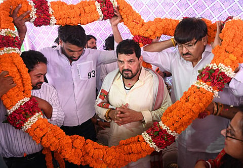 Former Wrestling Federation of India (WFI) chief and former BJP Lok Sabha MP Brij Bhushan Sharan Singh is greeted by his supporters after a Delhi court acquitted him in wrestlers' case.