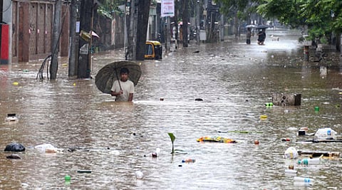 Guwahati: People wade through a flooded street at Anil Nagar following heavy rain in Guwahati, Assam, on Tuesday, August 4, 2026.