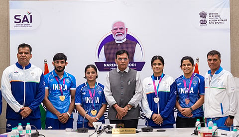 Commonwealth Games judo medallists, their coaches Jiwan Kumar Sharma (extreme right) and Virender Singh (extreme left) met union sports minister Mansukh Mandaviya (centre) on Tuesday