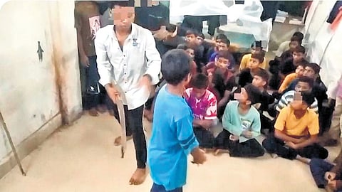 Video grab of a Class X student beating his junior in the school.