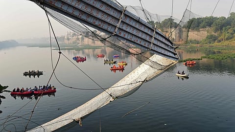 Remains of a suspension bridge that collapsed in Gujarat's Morbi in 2022 which claimed over 130 lives