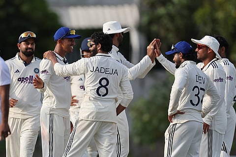 India players celebrate a wicket on Friday