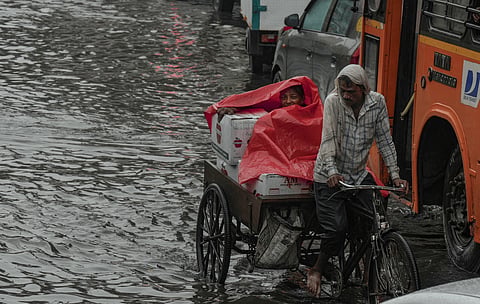 Vehicles stuck in traffic following rainfall, in New Delhi, Friday, Aug. 7, 2026.