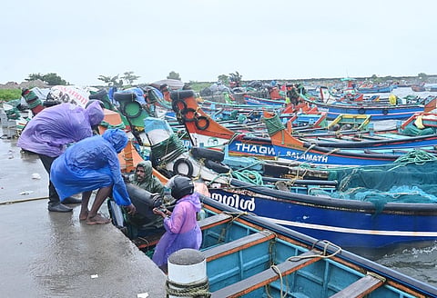 The fishermen managed to get the one who collapsed first out of the cold storage unit, but could not get out on their own.