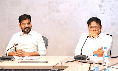 Chief Minister A Revanth Reddy along with Industries Minister D Sridhar Babu.