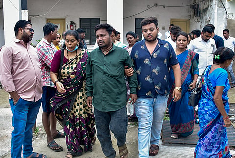 Family members and relatives mourn after a fire in the Neonatal Intensive Care Unit (NICU) of a government hospital killed at least three newborns, in Amravati district, Maharashtra, Monday, Aug. 24, 2026.