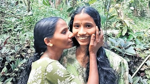Aswathimol K P with her mother Sreedevi at the tribal settlement in Ranni, Pathanamthitta