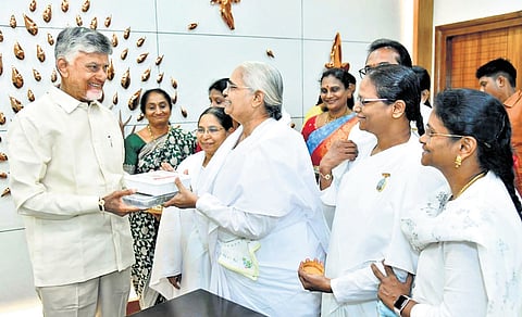 Brahmakumaris tie the Rakhis to Chief Minister N Chandrababu Naidu on the occasion of Raksha Bandhan festival on Friday | Express